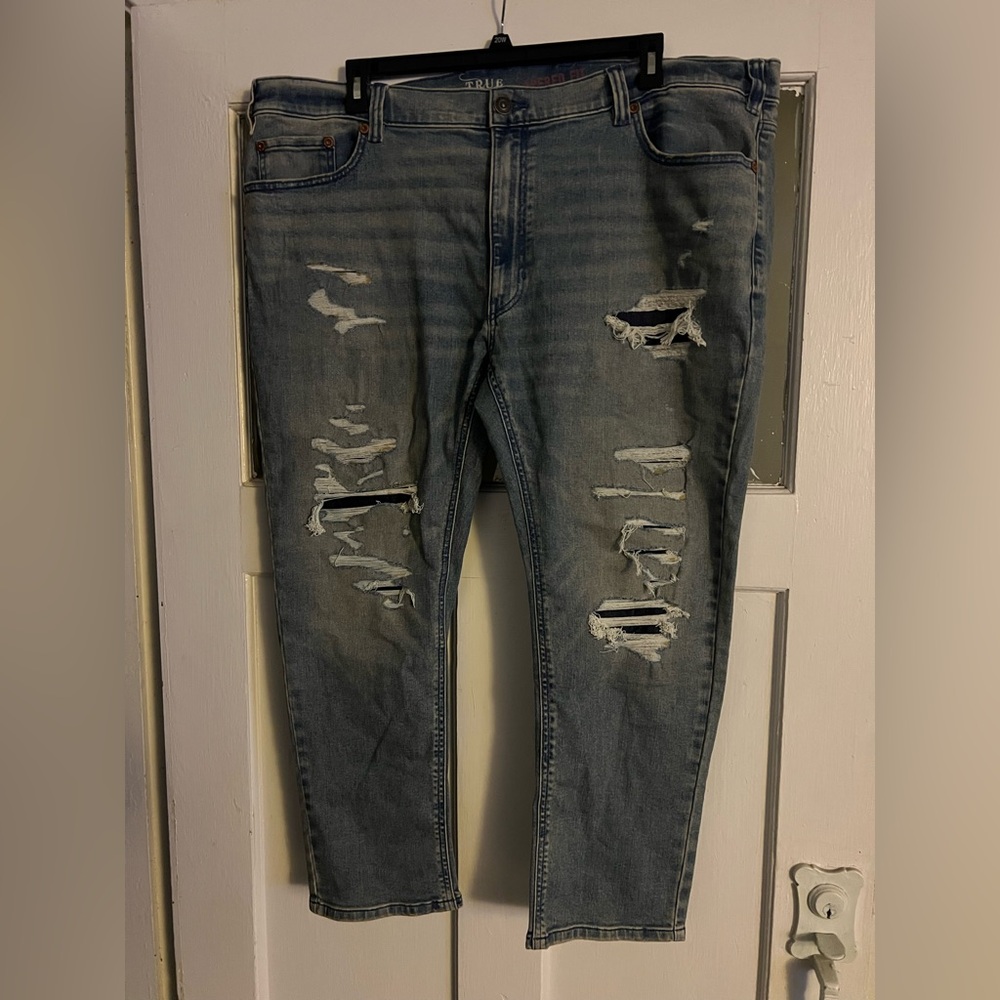Trendy Distressed Skinny Jeans in Blue